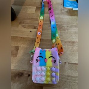 Cute as can be shoulder strap purses with fidget play!